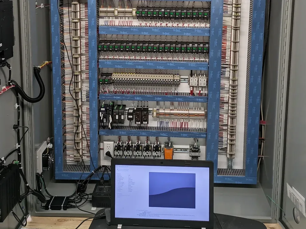 Industrial starter control panel with magnetic contactors, relays, and circuit breakers