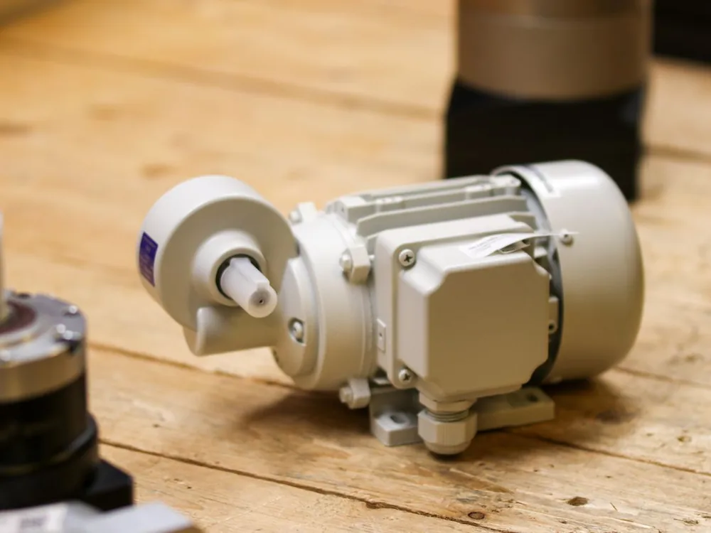 Disassembled electric motor components undergoing mechanical and electrical check