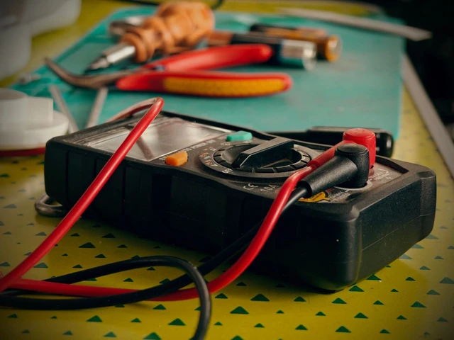Electric motor multimeter and insulation testing on workshop test bench